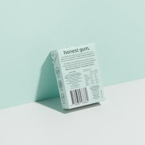 Honest Gum Eucalyptus Mint Plasitic Free Natural 17g leaning against a wall with the back of the packaging showing