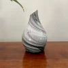 Zurma Diffuser Glass Vase Swirl on a wood table