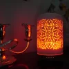 Zurma Diffuser Mandala Glow in the dark with the amber light turned on.
