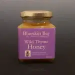 a jar of BlueskinBay Wild Thyme Honey 250g