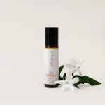 HerbFarm Sia Natural Perfume 10ml next to Jasmine flowers.