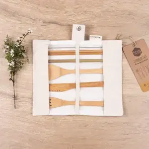 Unrolled Honeywrap Reusable Cutlery Set Cream on a wooden table