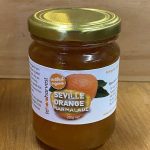 a jar of TeHoro Seville Orange Marmelade 250g on a wood table