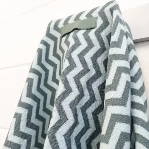 Ecovask Hair Travel Towel Sea Foam Chevron hanging on a hook