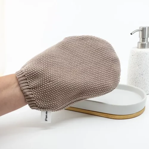 Ecovask Wash Mitt Hummus next a soap dish and soap dispenser
