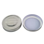 Showing the top and bottom of GoodLife Preserving Metal Pop Button Lid 86mm