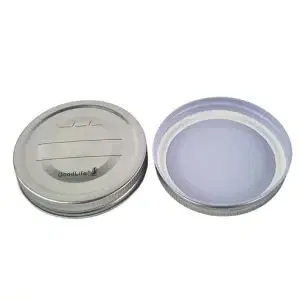Showing the top and bottom of GoodLife Preserving Metal Pop Button Lid 86mm