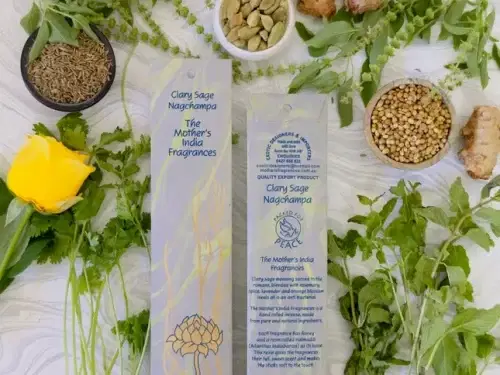 MothersFragrances Clary Sage Nagchampa on a table surrounded by incense