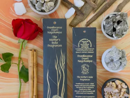 MothersFragrances Frankincense Nagchampa on a table surrounded by incense