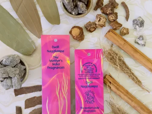 MothersFragrances Oudh Nagchampa on a table surrounded by incense