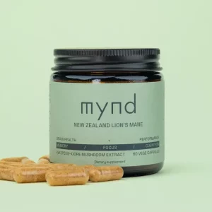 a jar of Mynd Pekepeke Lions Mane 60cps with a few capsules next to it