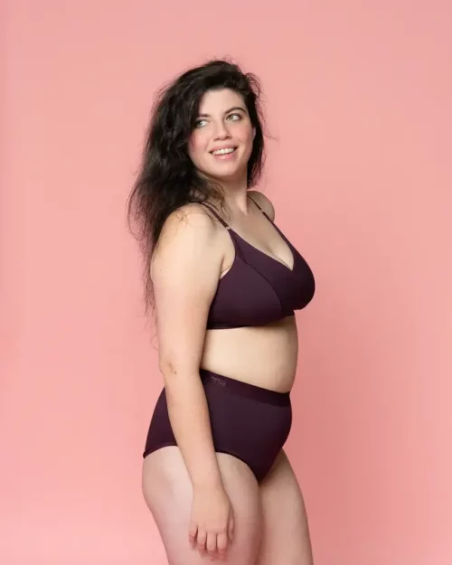 A woman wearing Nisa Albertine Womans Naturals Range Boysenberry coloured Bralette