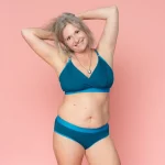 A woman wearing Nisa Albertine Womans Naturals Range Lake coloured Bralette