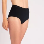 A woman wearing Nisa Sabina Woman Naturals High Cotton Brief Black coloured