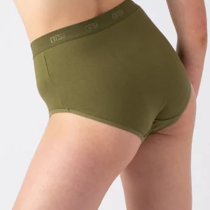 A woman wearing Nisa Sabina Woman Naturals High Cotton Brief Moss coloured