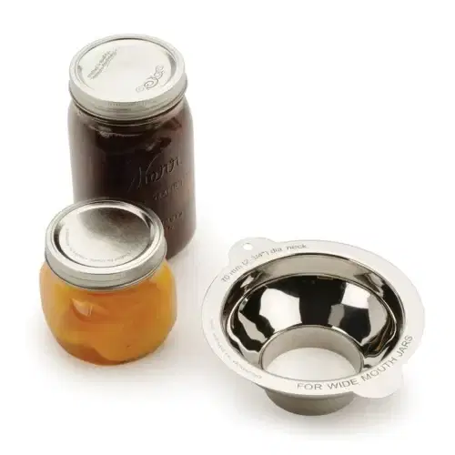 RSVP Funnel Metal Wide Mouth on a table next to two mason jars
