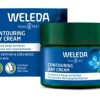 a container of Weleda Contouring Day Cream 40ml next to its packaging