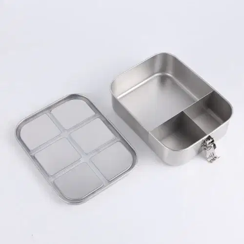 View of an open BentoNinja Leak Proof Bento 3-Compartment Stainless Steel
