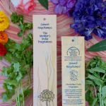 MothersFragrances Ganesh Nagchampa 20pk on a pink table surounded by flowers and herbs