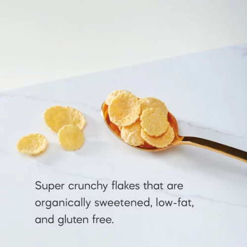 Natures Path Corn Flakes Honey on a spoon on a marble counter top