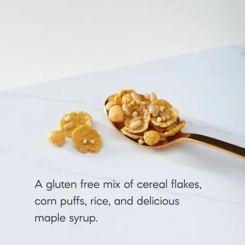 Natures Path Sunrise Crunchy Maple on a spoon on a marble counter top