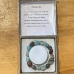 Beaded Bracelet Lge Amazonite in its packaging on a wood table
