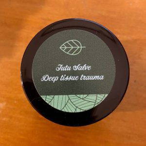 a jar of NaturallyTrish Tutu Salve Tissue Trauma
