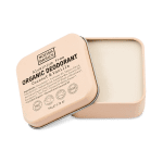 a tin of Noosa Basics Deodorant Cream Coconut Vanillal 50g with its lid off