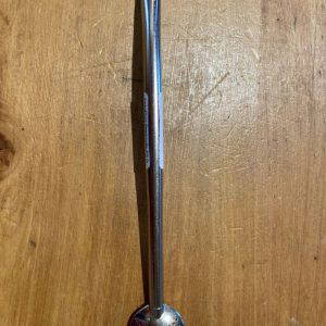 YerbaMate Straw Lollip Filter Stainless Steel on a wooden table
